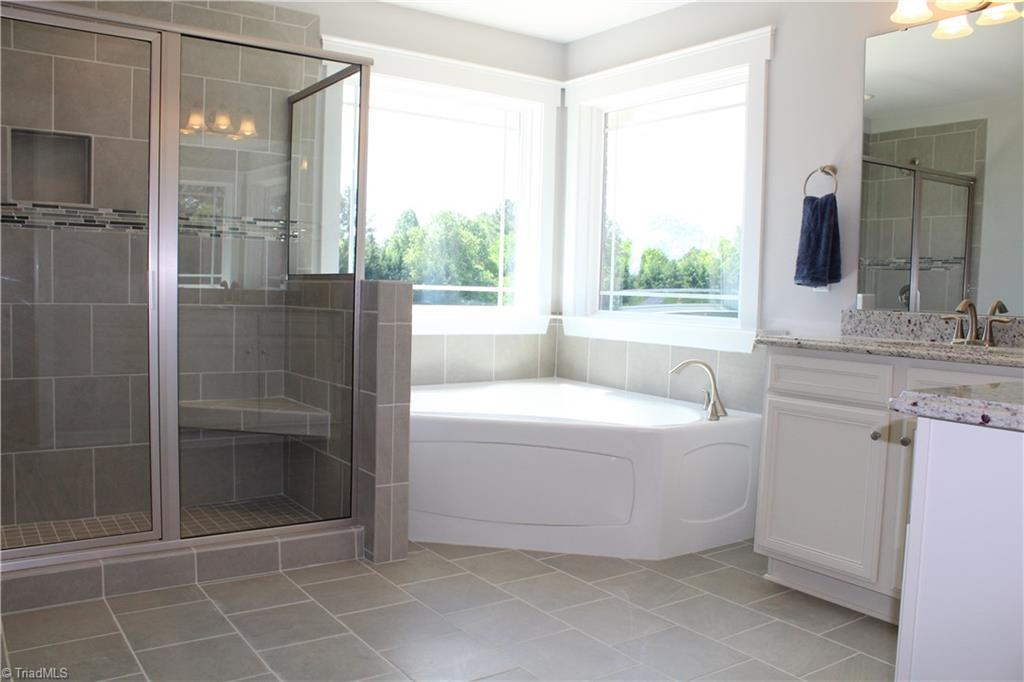 2629 Lunsford Road Summerfield, NC 27358 - Photo 15 of 28 Another view of Owner's luxury bathroom featuring corner garden tub