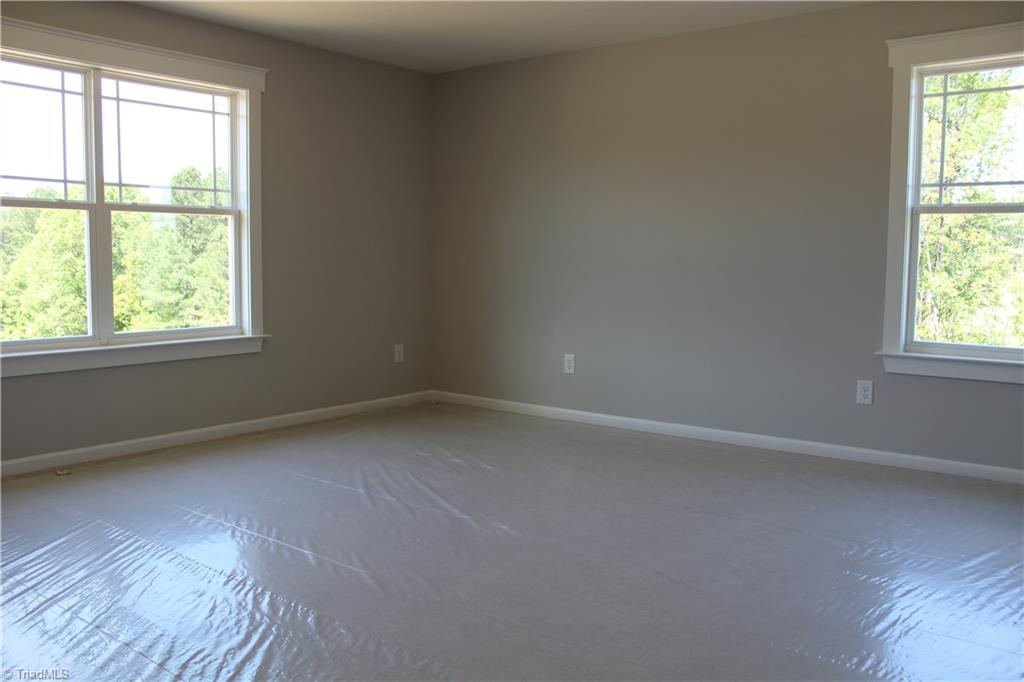 2629 Lunsford Road Summerfield, NC 27358 - Photo 17 of 28 Large Bedroom 2 with lots of windows