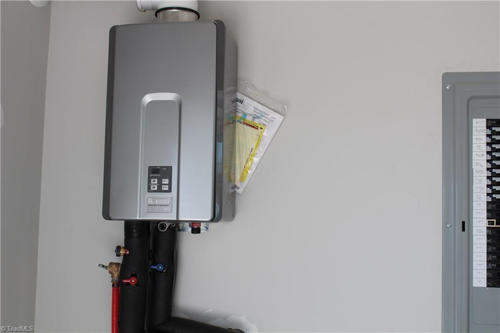 2629 Lunsford Road Summerfield, NC 27358 - Photo 23 of 28 Tankless water heater