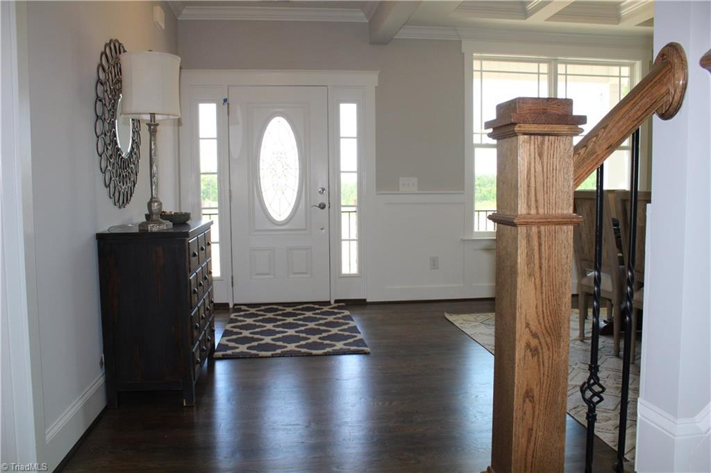 Open foyer with dining room to right