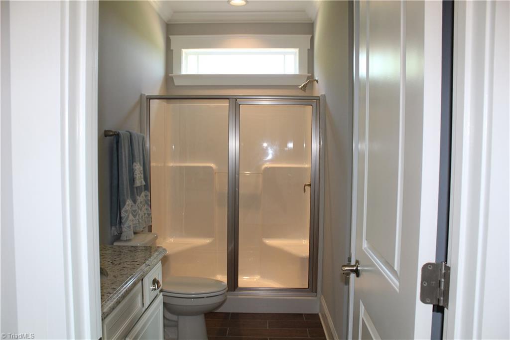 Full main level bathroom with optional 5 foot shower and transom window