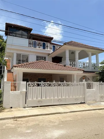 a view of a house with a balcony