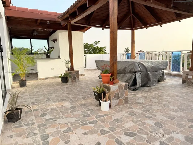 a view of a terrace with chairs