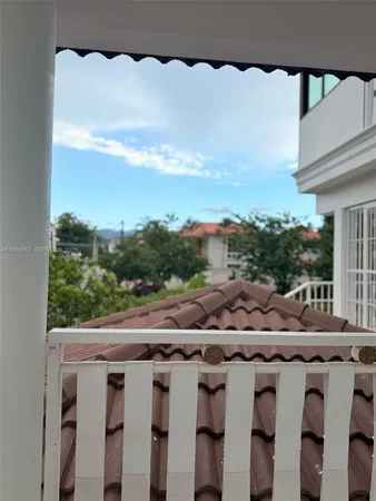 a view of a terrace with chairs