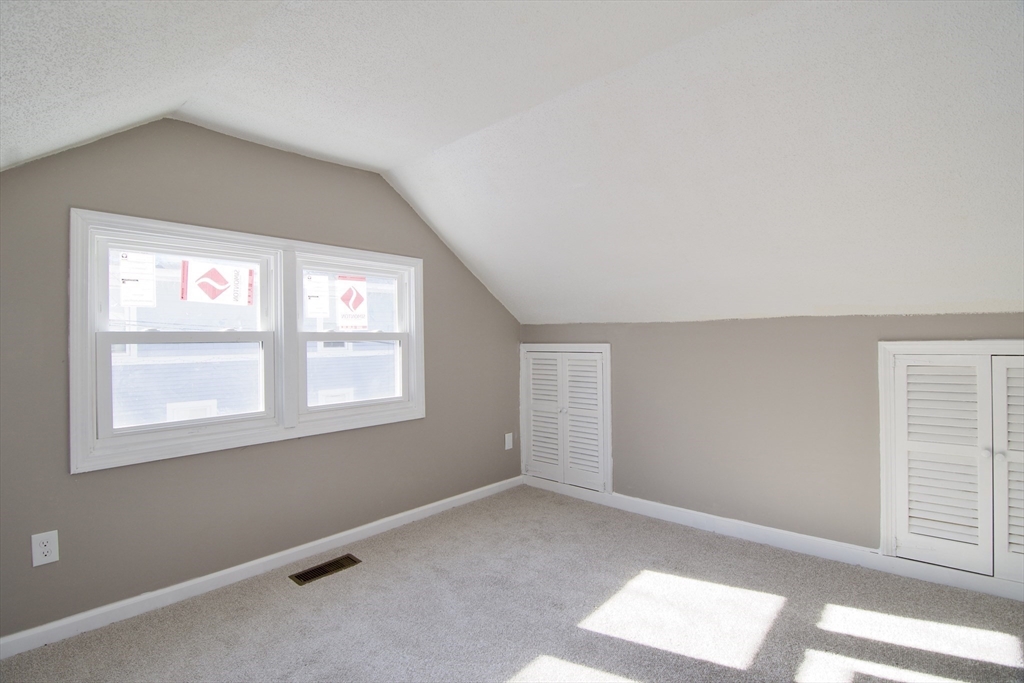 511 Parker Street Springfield, MA 01129 - Photo 22 of 41 an empty room with windows