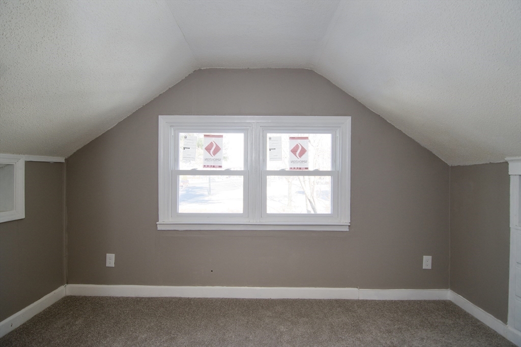 511 Parker Street Springfield, MA 01129 - Photo 33 of 41 an empty room with a window