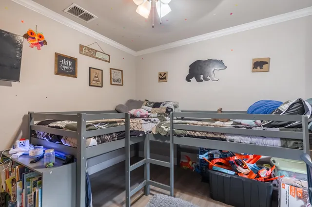 a room with furniture and a flat screen tv