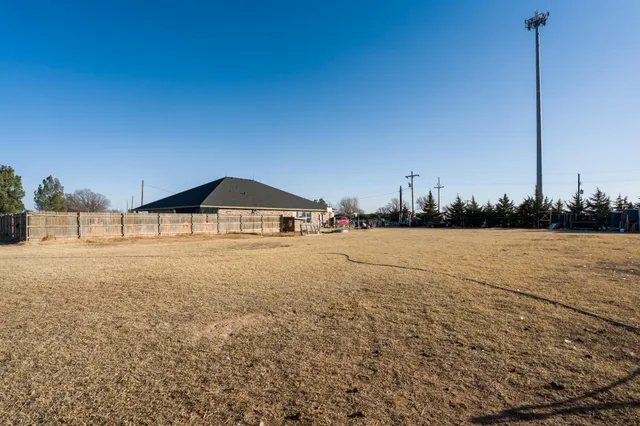a street view with large residential house