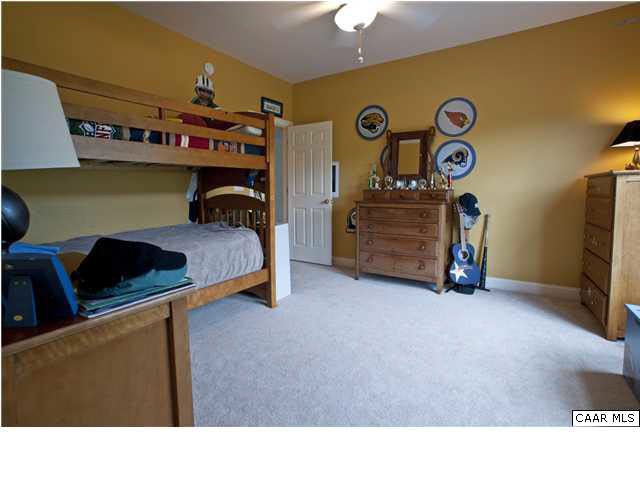 3505 Rocks Mill Lane Charlottesville, VA 22903 - Photo 29 of 33 a living room with furniture and a flat screen tv