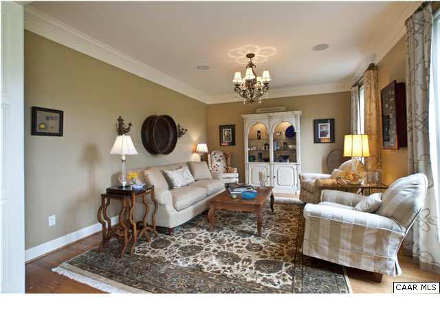 3505 Rocks Mill Lane Charlottesville, VA 22903 - Photo 8 of 33 a living room with furniture a chandelier and a rug