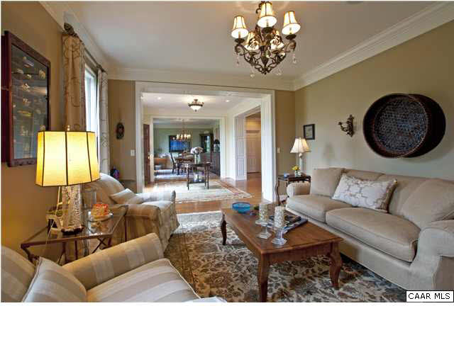 3505 Rocks Mill Lane Charlottesville, VA 22903 - Photo 9 of 33 a living room with furniture a chandelier and a large mirror