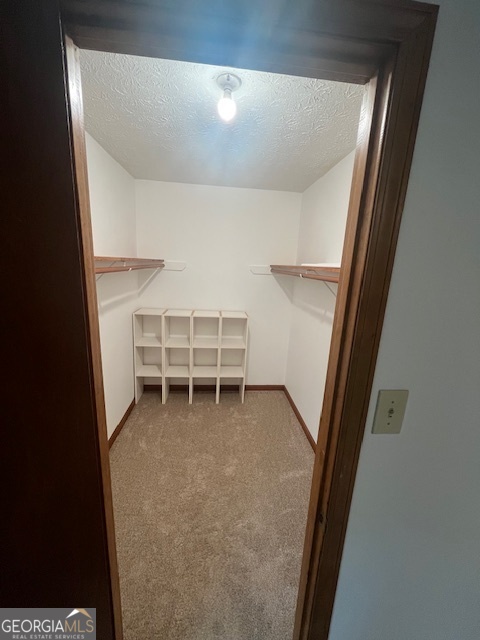 155 Hilo Road Fayetteville, GA 30215 - Photo 3 of 15 a view of room with stairs and a window