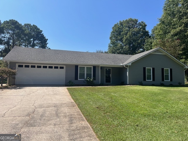 155 Hilo Road Fayetteville, GA 30215 - Photo 10 of 15 a front view of a house with yard