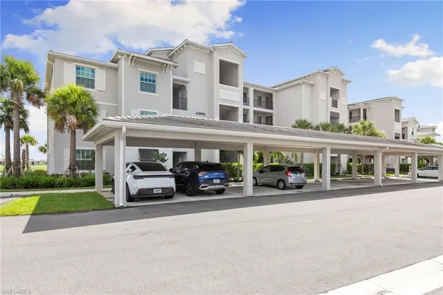 a view of a street with cars