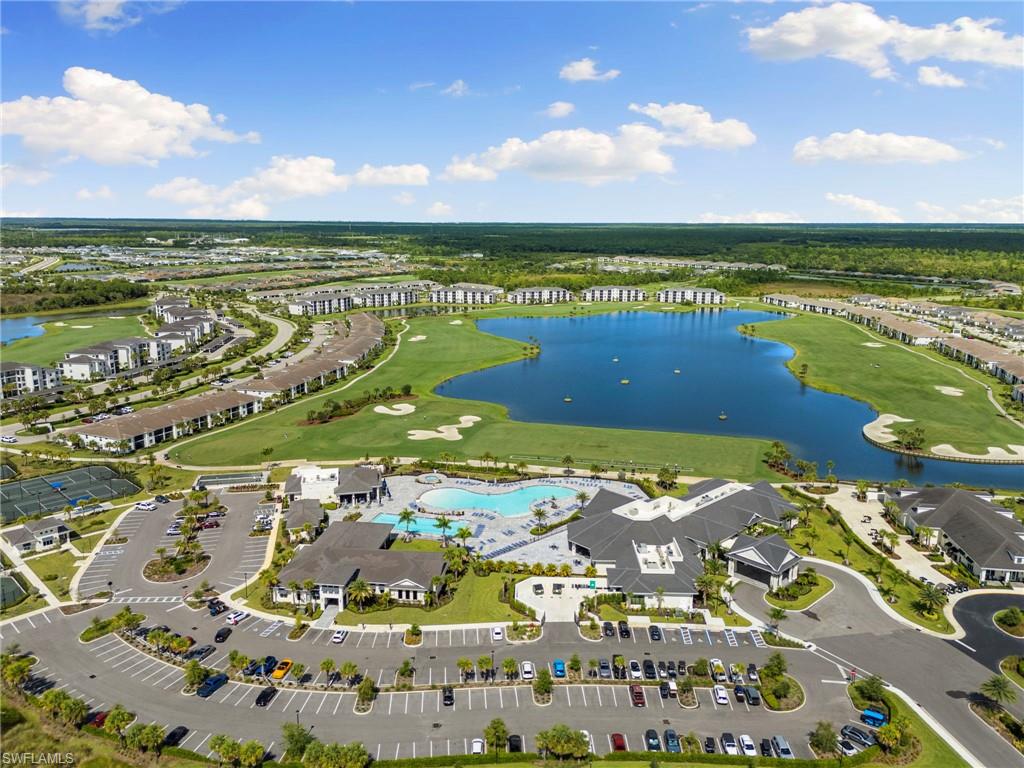 43993 Boardwalk Loop, Unit 1914 Punta Gorda, FL 33982 - Photo 31 of 36 Drone / aerial view of a local golf course and a nearby body of water