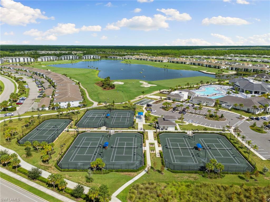 43993 Boardwalk Loop, Unit 1914 Punta Gorda, FL 33982 - Photo 34 of 36 View of property location with a nearby body of water, a golf course, and nearby suburban area