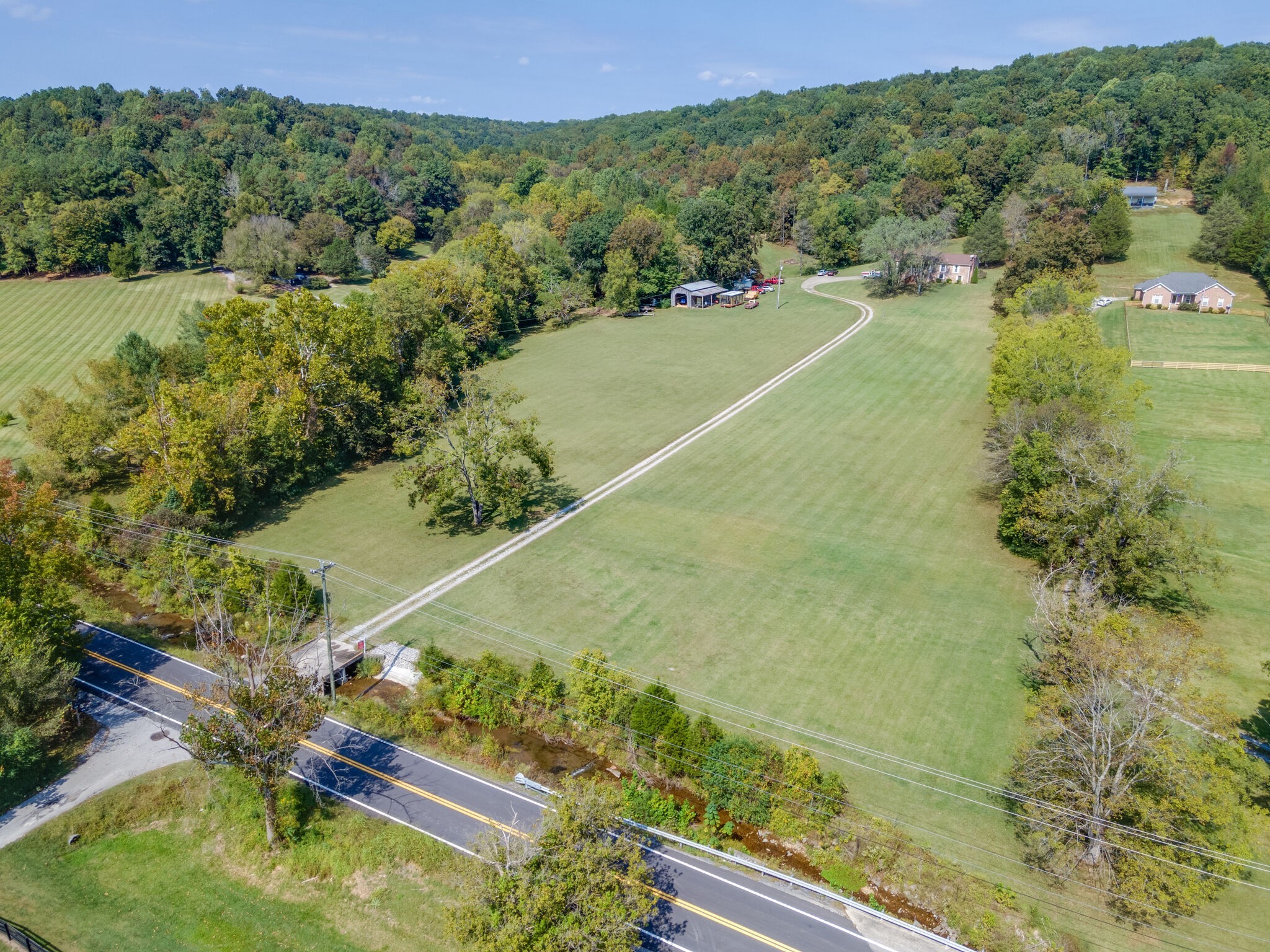 5472 Pinewood Road Franklin, TN 37064 - Photo 3 of 38 a view of a lake with a yard