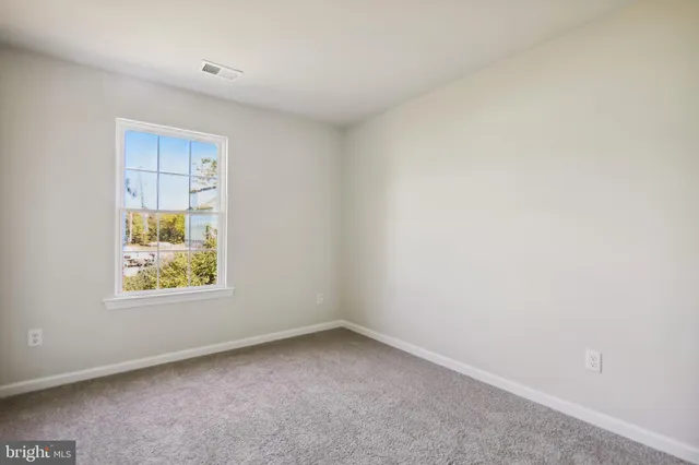 an empty room with window