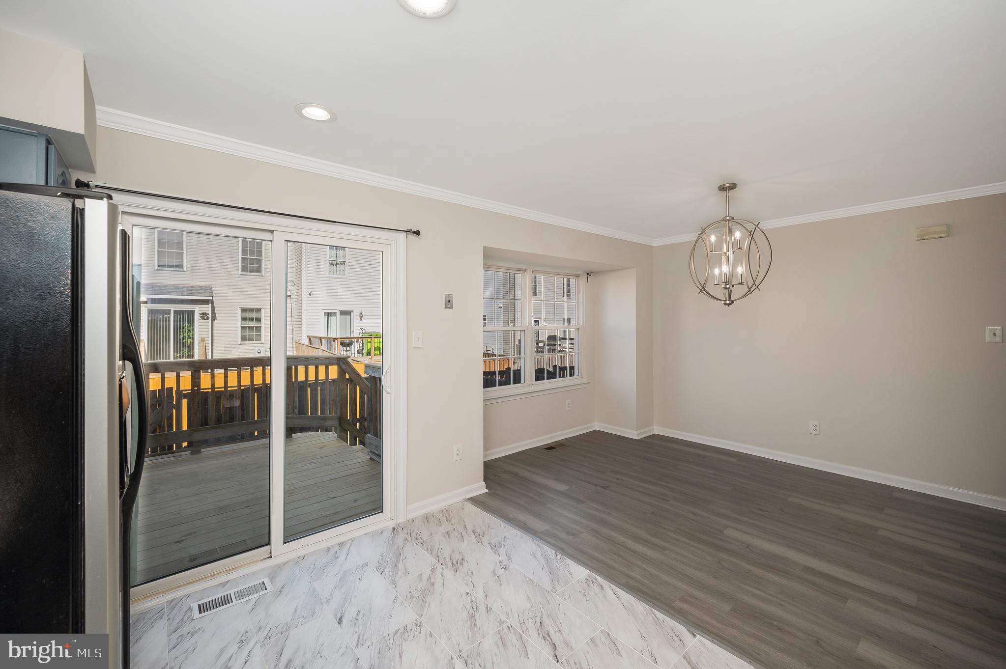 17950 Milroy Drive Dumfries, VA 22026 - Photo 16 of 42 a view of a livingroom with wooden floor