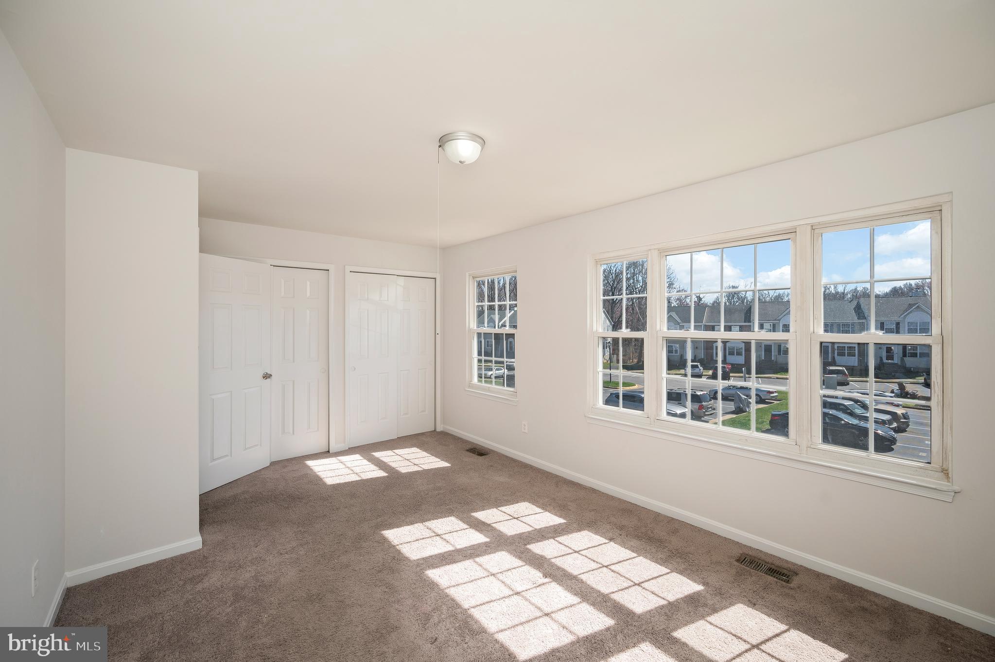 17950 Milroy Drive Dumfries, VA 22026 - Photo 22 of 42 a view of an empty room with a window