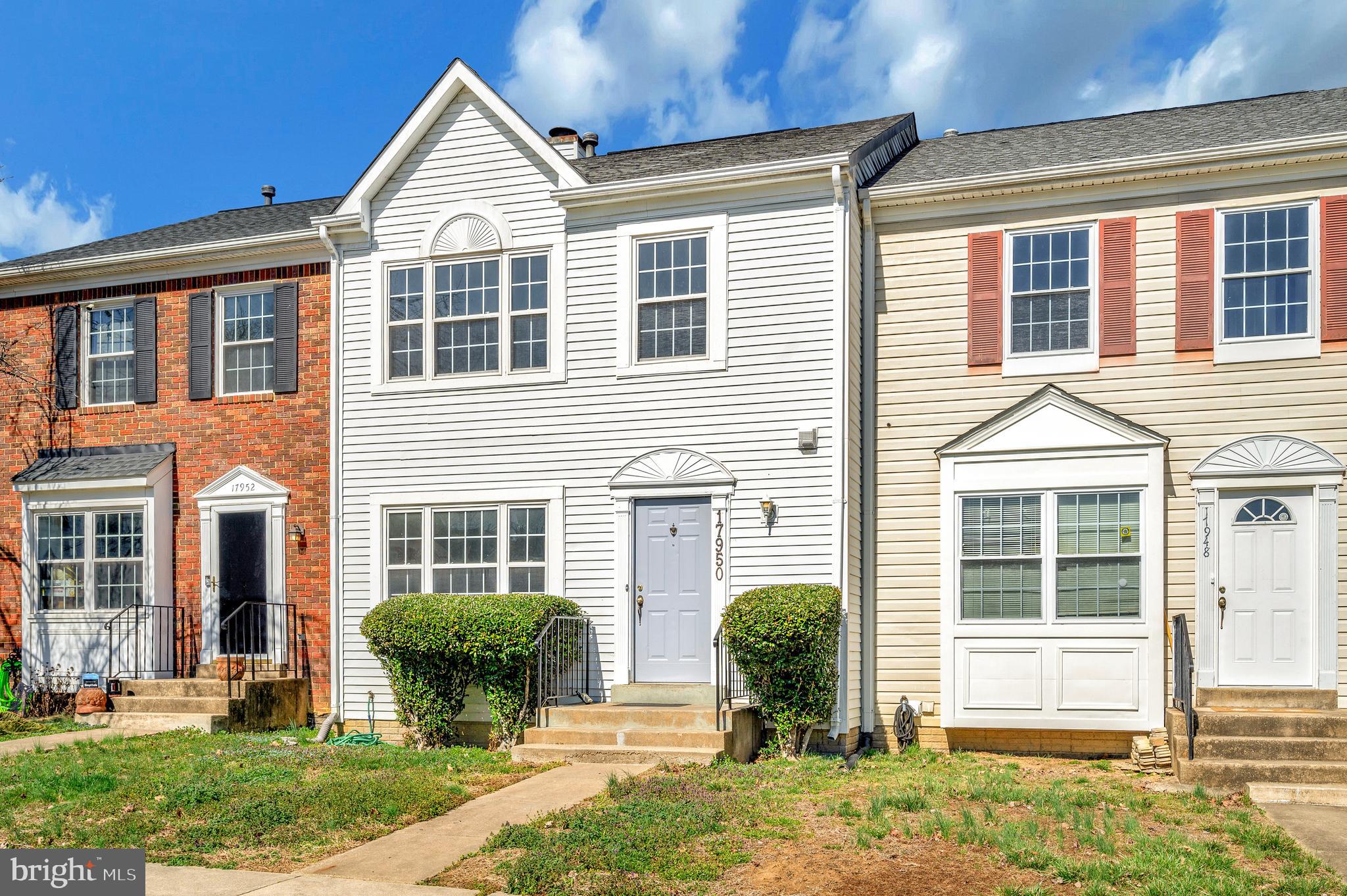 17950 Milroy Drive Dumfries, VA 22026 - Photo 3 of 42 a front view of a house with a yard