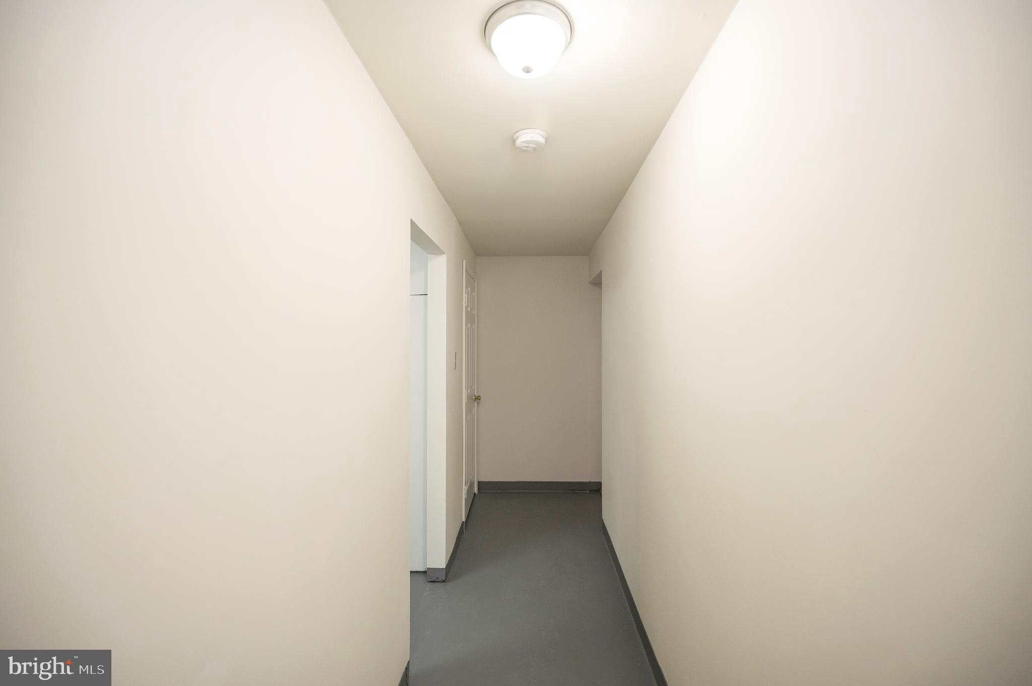 17950 Milroy Drive Dumfries, VA 22026 - Photo 33 of 42 a view of a hallway