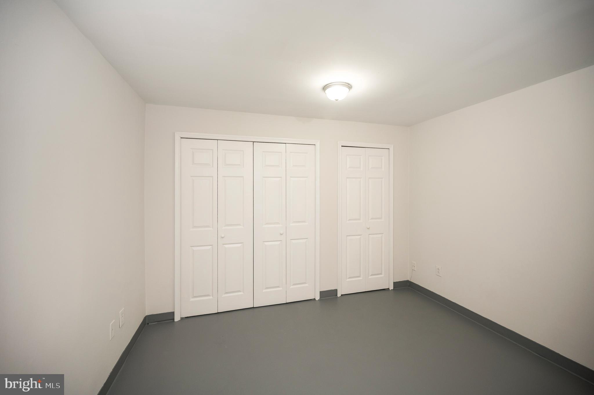 17950 Milroy Drive Dumfries, VA 22026 - Photo 34 of 42 an empty room with a empty space and window