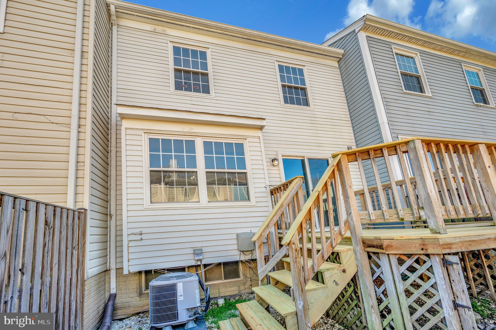 17950 Milroy Drive Dumfries, VA 22026 - Photo 41 of 42 a view of a house with wooden deck