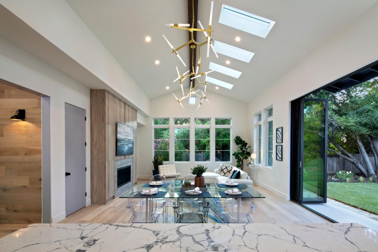 1 Holbrook Lane Atherton, CA 94027 - Photo 5 of 19 a living room with patio furniture potted plant and a large window