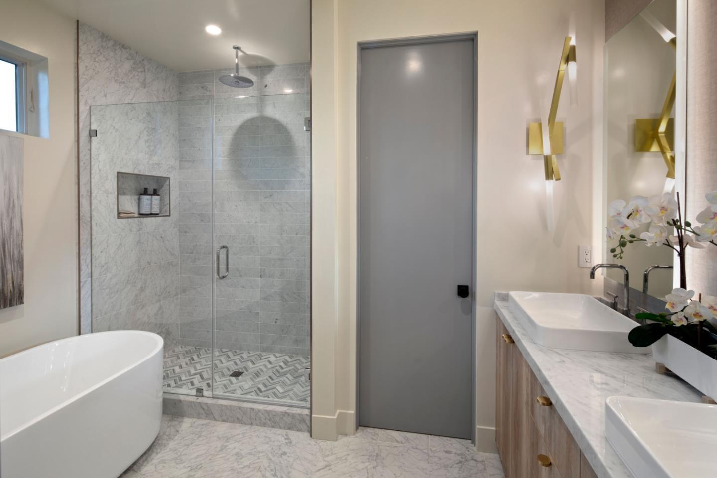 1 Holbrook Lane Atherton, CA 94027 - Photo 10 of 19 a bathroom with a granite countertop sink a shower and a mirror