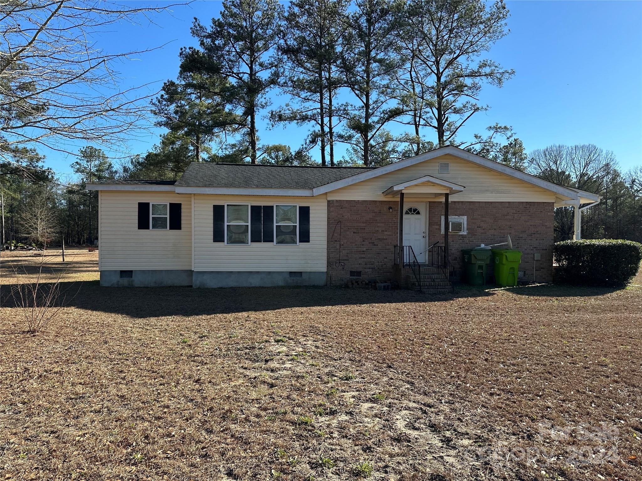 116 Haygood Road Blythewood, SC 29016 - Photo 3 of 34 a front view of a house with a yard