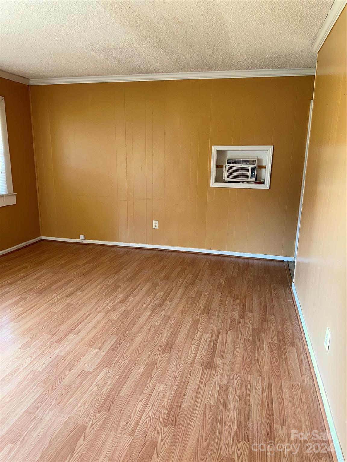 116 Haygood Road Blythewood, SC 29016 - Photo 4 of 34 a view of an empty room with wooden floor