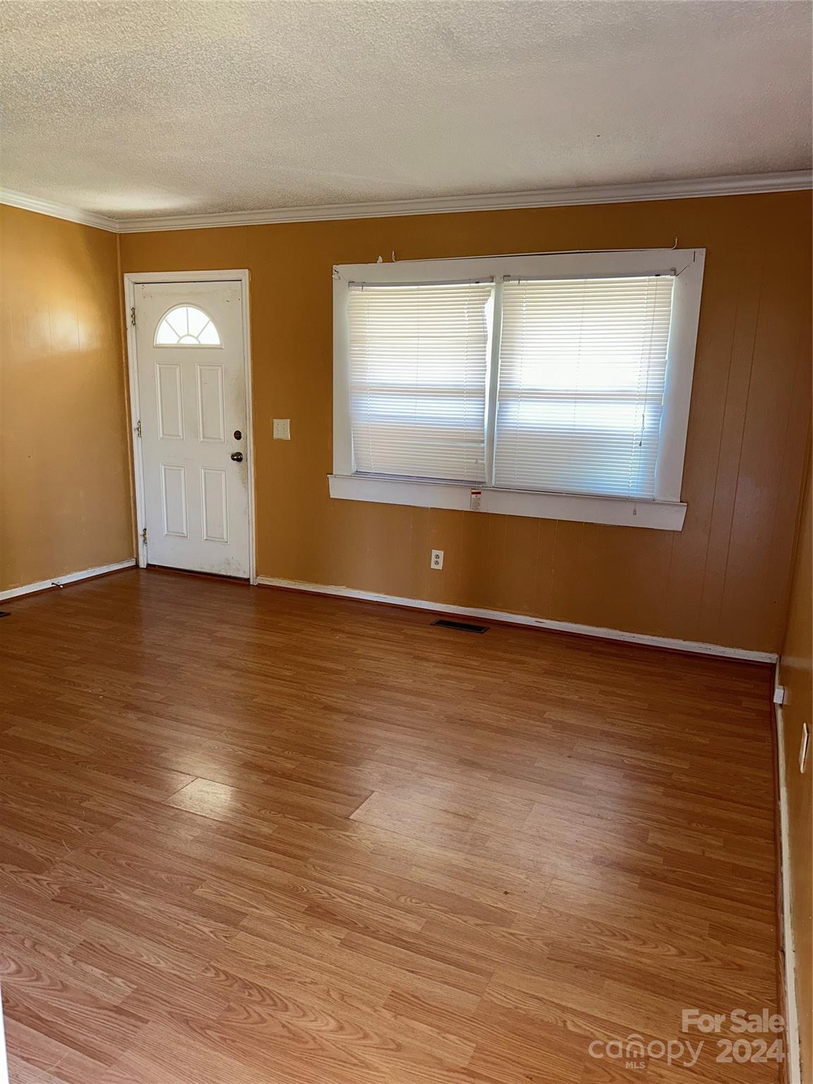 116 Haygood Road Blythewood, SC 29016 - Photo 5 of 34 a view of empty room with wooden floor and fan