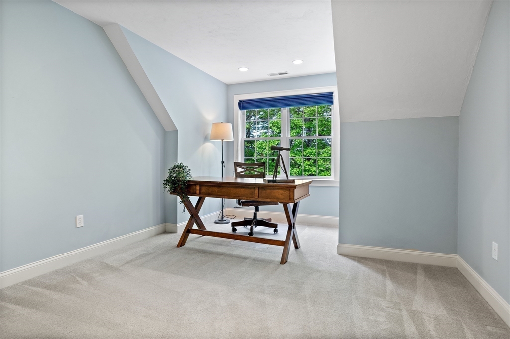 247 Whiley Road Groton, MA 01450 - Photo 21 of 42 a room with furniture and a window