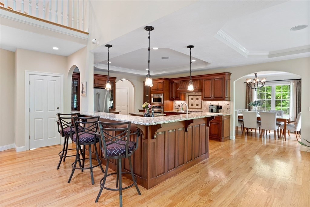 247 Whiley Road Groton, MA 01450 - Photo 4 of 42 a view of a dining room with furniture window and wooden floor