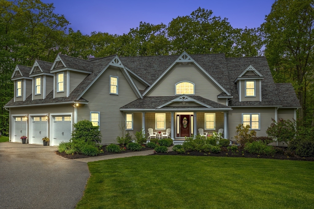 247 Whiley Road Groton, MA 01450 - Photo 42 of 42 a front view of a house with a yard