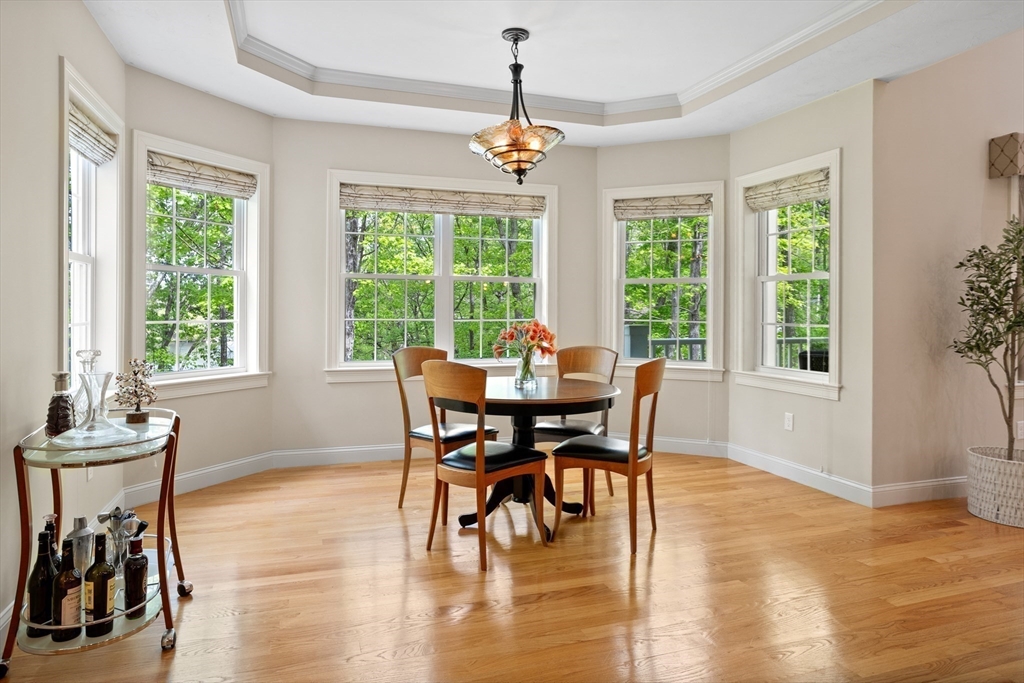 247 Whiley Road Groton, MA 01450 - Photo 8 of 42 a dining room with furniture window wooden floor