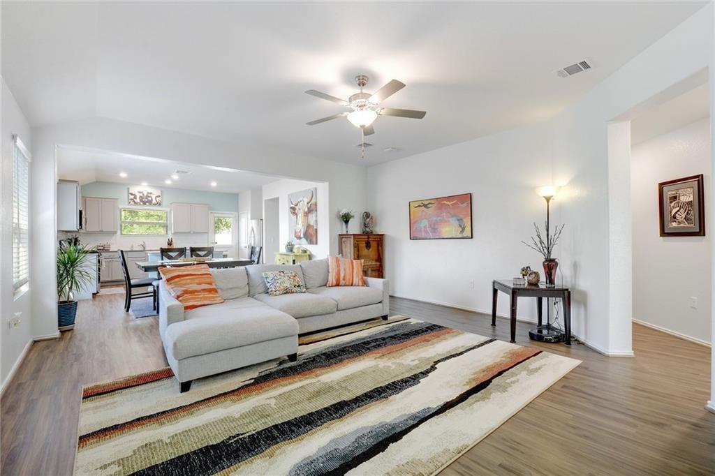 6813 Colorado Bluffs Road Austin, TX 78744 - Photo 3 of 20 Living area with ceiling fan, wood finished floors, and recessed lighting