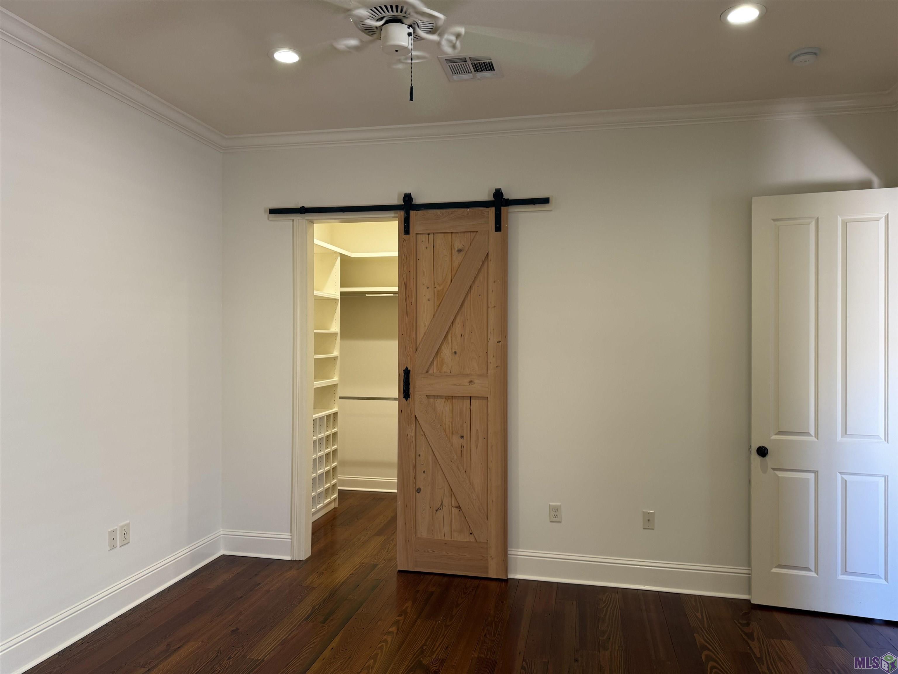 11523 Settlement Boulevard Baton Rouge, LA 70810 - Photo 12 of 18 Master closet barn door