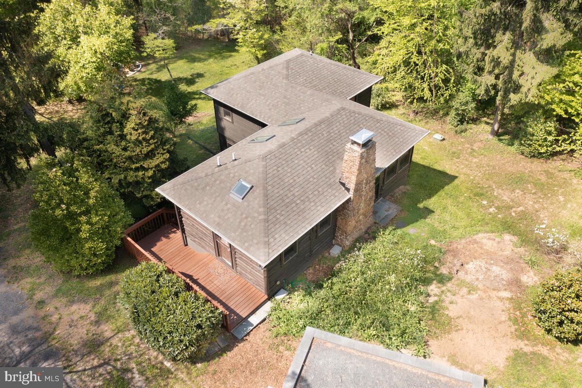2359 Acacia Road Port Republic, MD 20676 - Photo 46 of 69 an aerial view of a house with a yard and large trees