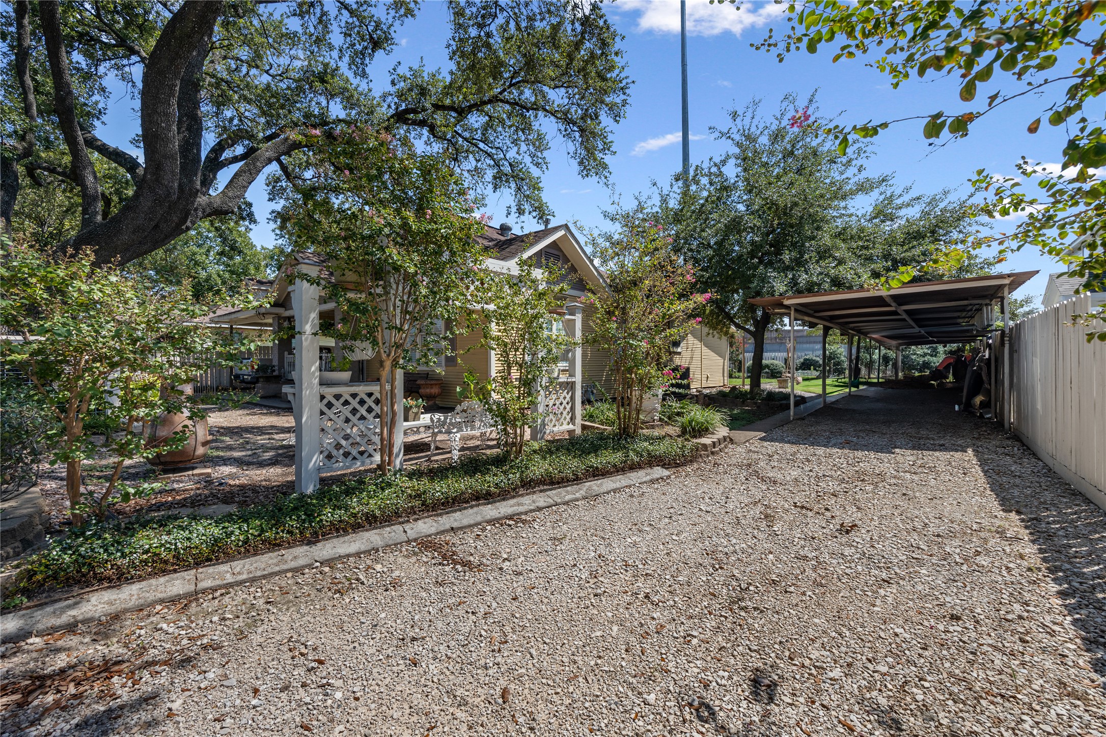1310 Reid Street, Unit B Houston, TX 77022 - Photo 11 of 13 a view of a house with a yard and sitting area