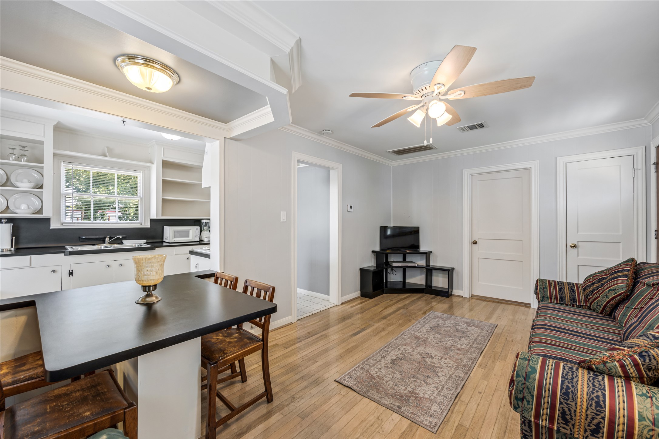 1310 Reid Street, Unit B Houston, TX 77022 - Photo 5 of 13 a living room with furniture and a large window