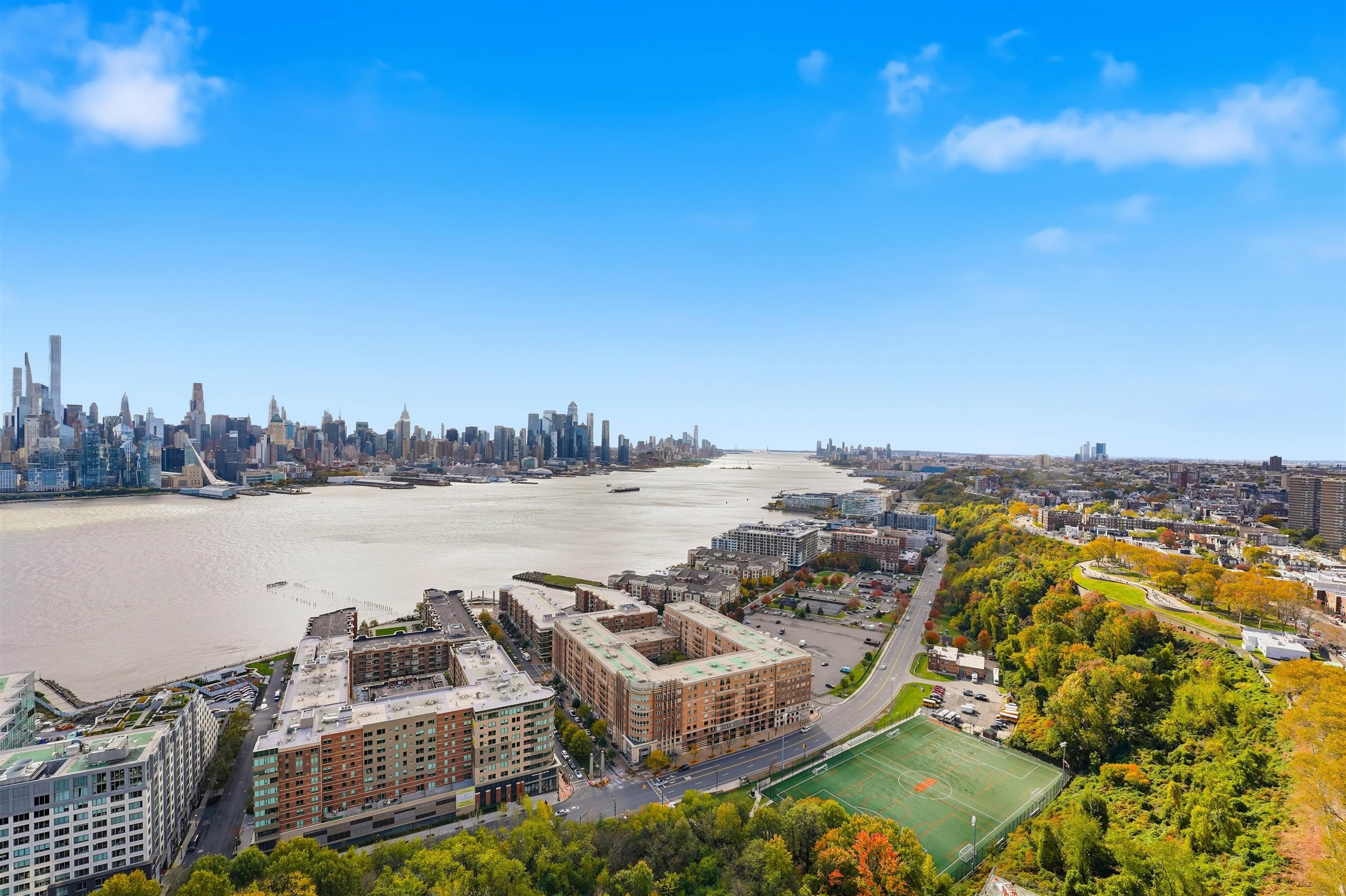 6040 Boulevard East, Unit 32E West New York, NJ 07093 - Photo 14 of 27 a view of a lake with tall building