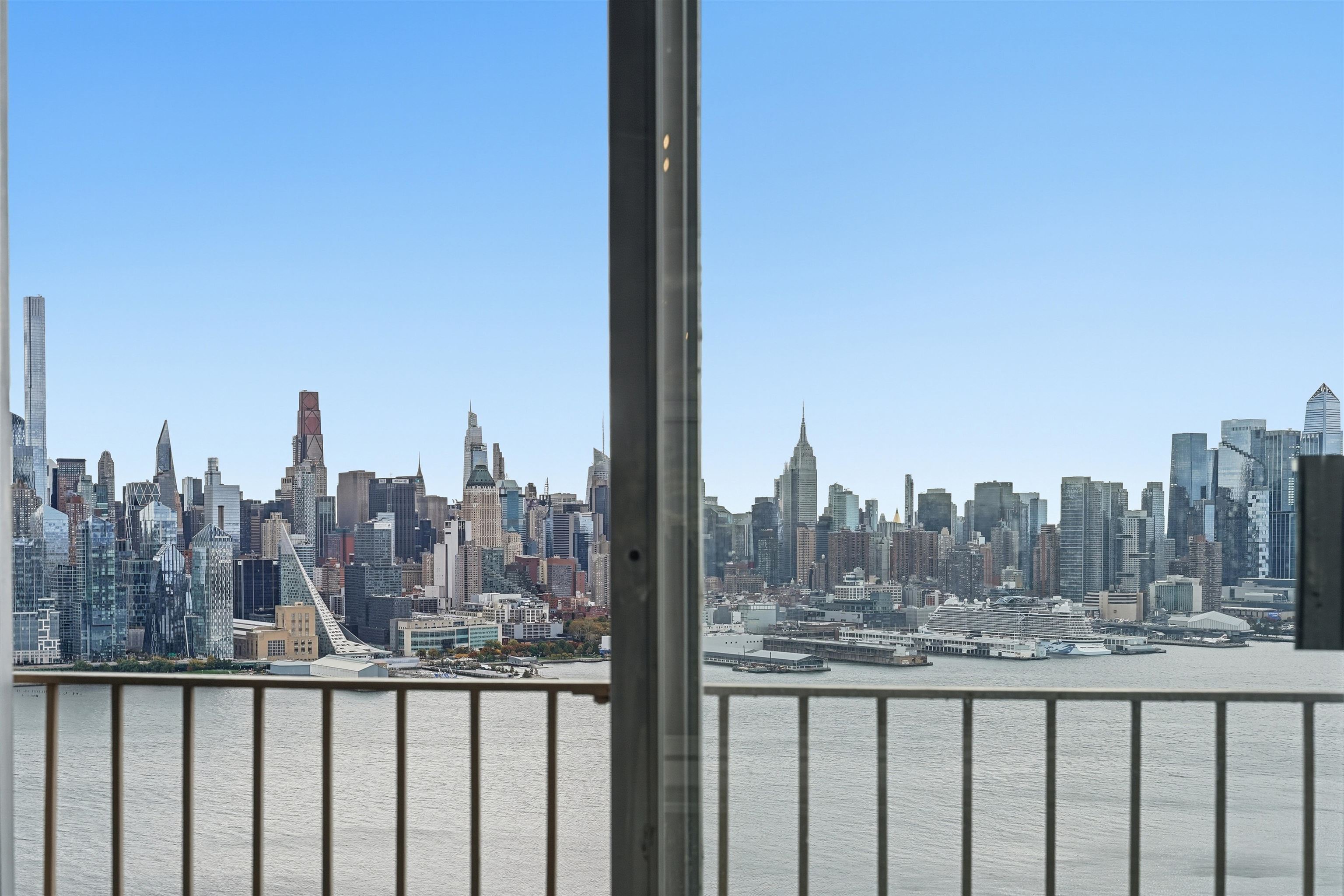 6040 Boulevard East, Unit 32E West New York, NJ 07093 - Photo 18 of 27 a view of a city with tall buildings