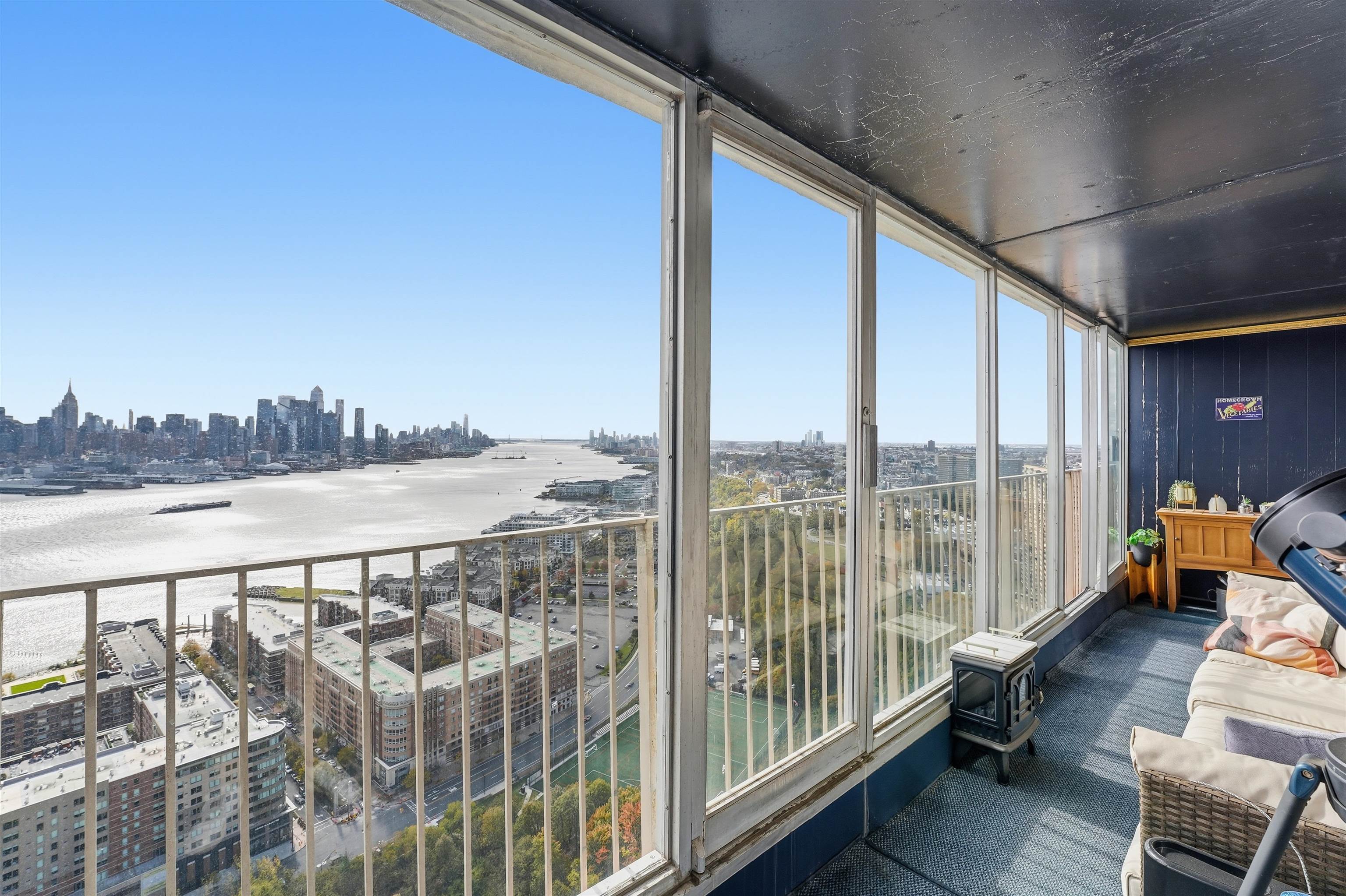 6040 Boulevard East, Unit 32E West New York, NJ 07093 - Photo 10 of 27 a view of balcony with couch