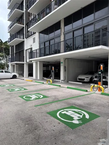 a view of a street with a building