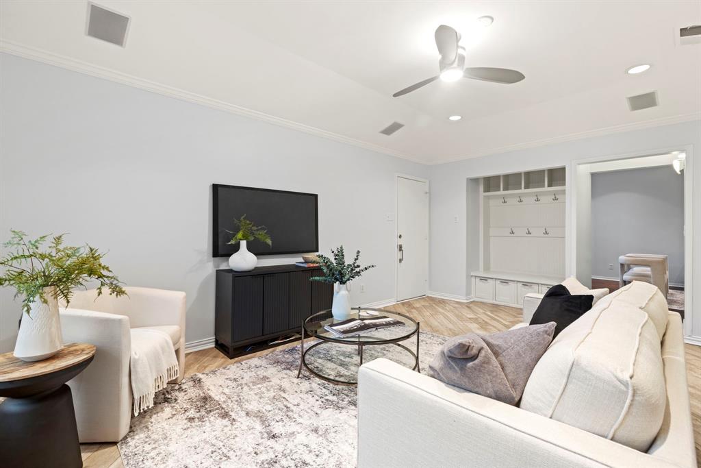16707 Rustic Meadows Drive Dallas, TX 75248 - Photo 15 of 33 a living room with furniture and a flat screen tv