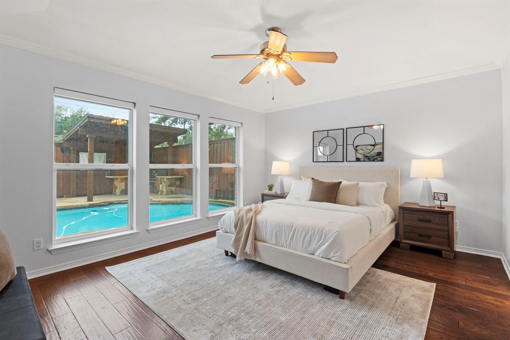 16707 Rustic Meadows Drive Dallas, TX 75248 - Photo 17 of 33 a bedroom with a large bed and a large window