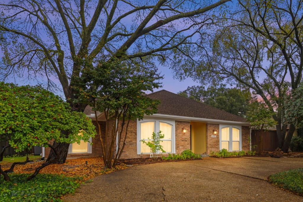 16707 Rustic Meadows Drive Dallas, TX 75248 - Photo 32 of 33 a front view of a house with a tree