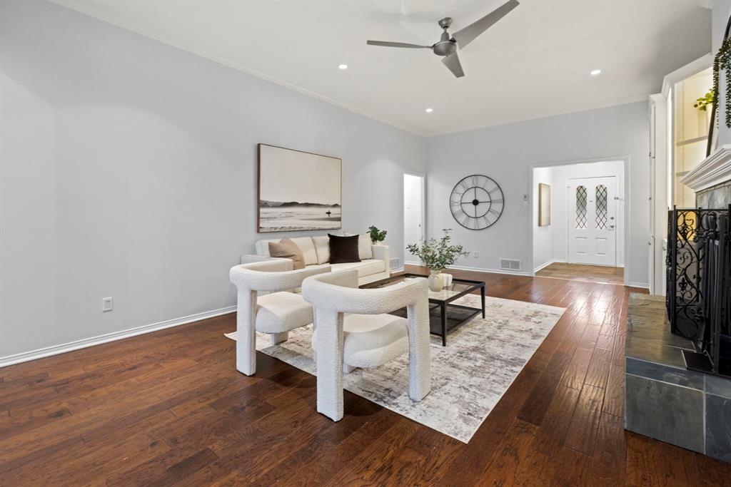16707 Rustic Meadows Drive Dallas, TX 75248 - Photo 5 of 33 a living room with furniture and a flat screen tv